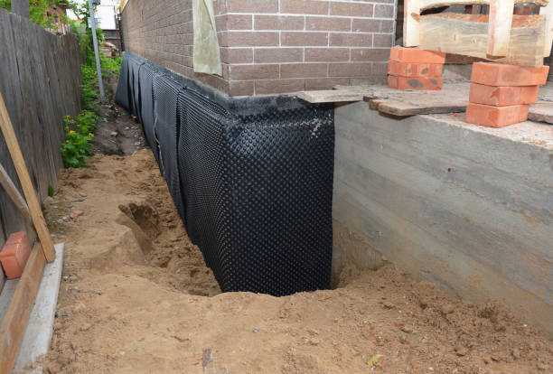 SJ Waterproofing Pros technician performing targeted Sump Pump Installation assessment in Helenwood, TN